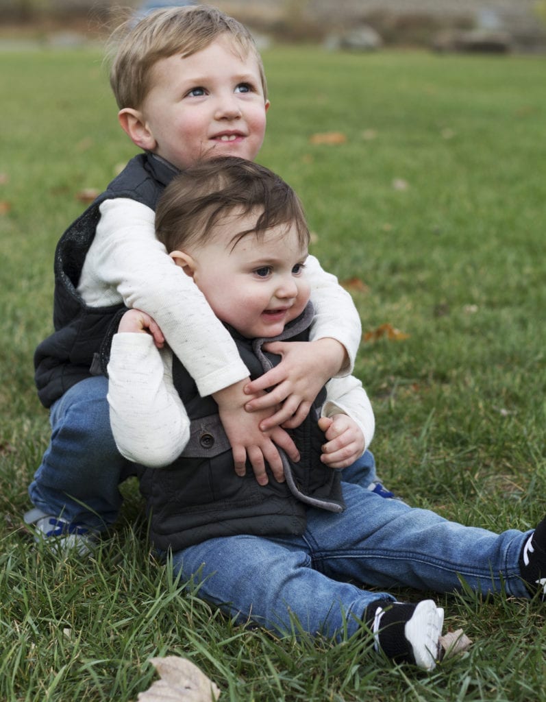 two brothers playing in the park